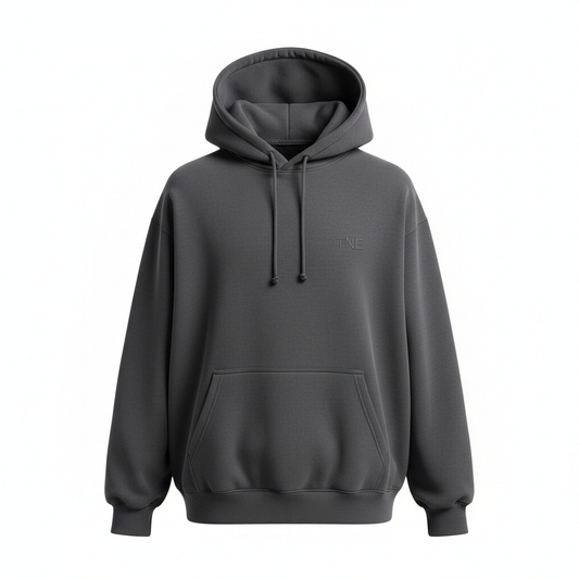 Charcoal gray oversized heavyweight hoodie with TNE embroidered logo on ghost mannequin